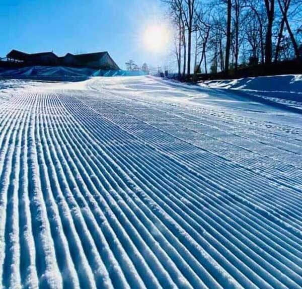 https://sawcreek.org/wp-content/uploads/2024/12/ski-area-groomed-600x574.jpg